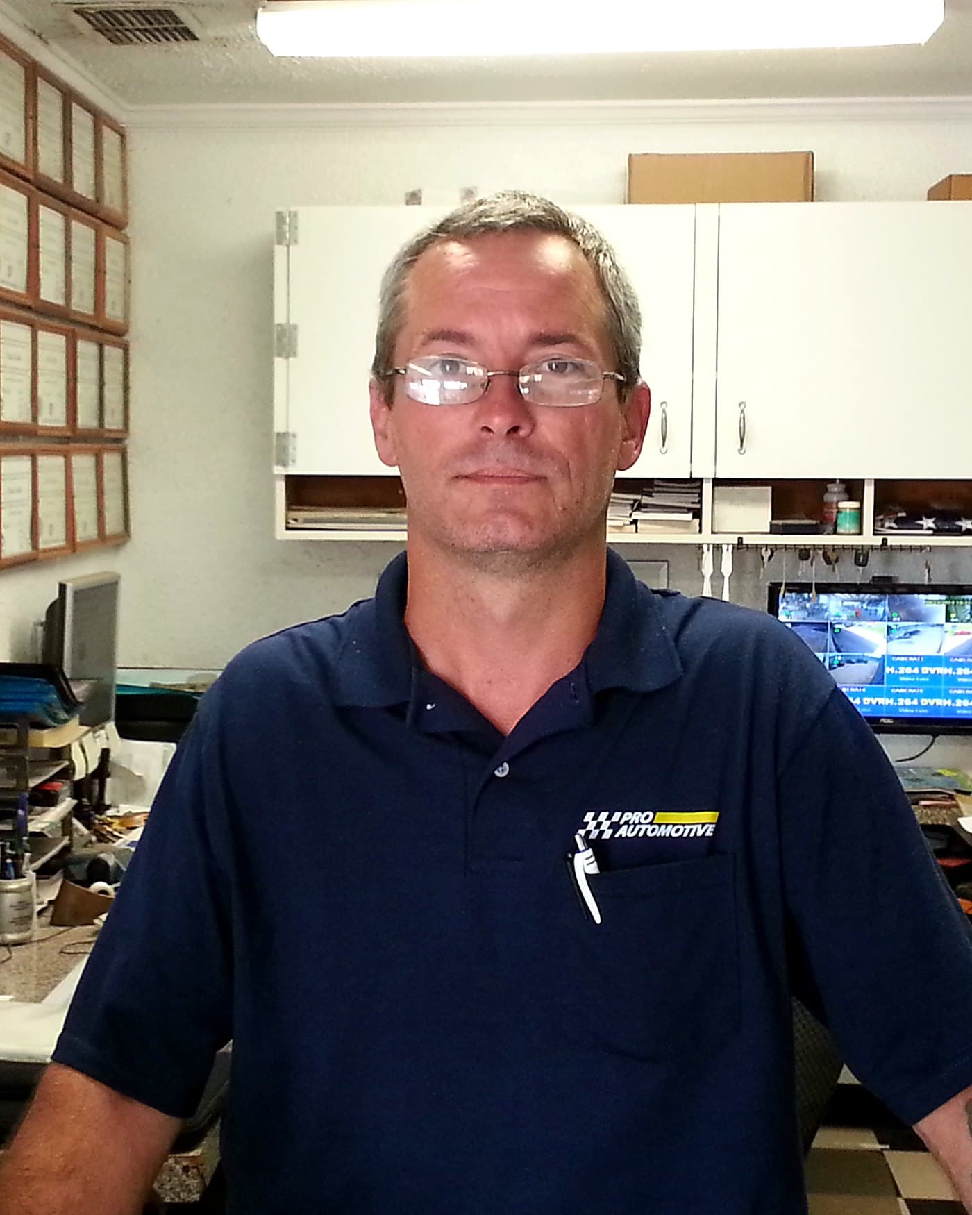 Jamie Peal, manager and technical advisor at Pro Automotive Center, at the front counter
